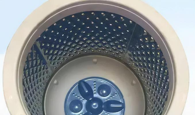 洗衣机投料盒拆卸清洗方法（让你的洗衣机始终干净如新）