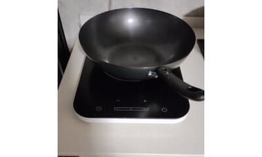电磁炉一启动就停是什么原因？如何快速解决？